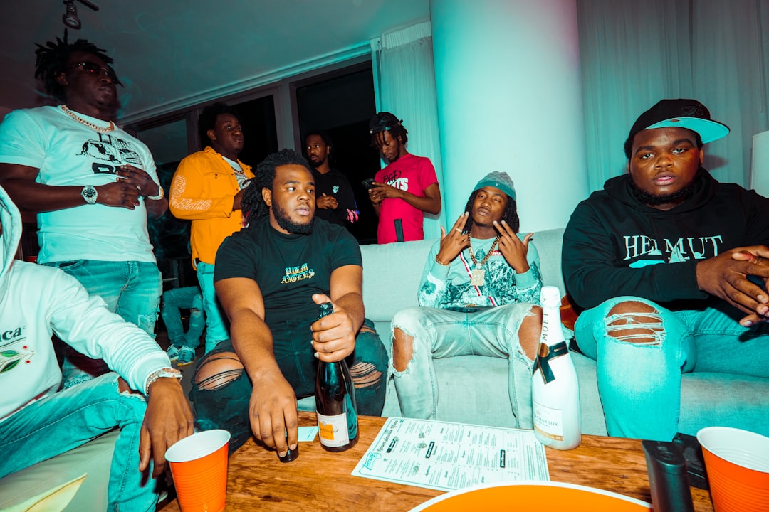 group of people sitting on chair