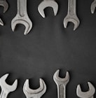 a group of wrenches arranged in a circle