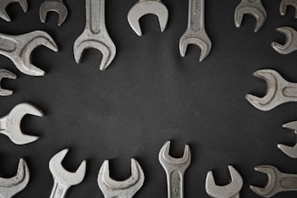 a group of wrenches arranged in a circle