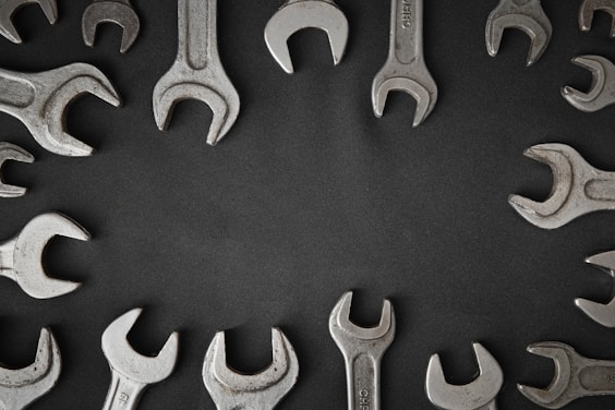 a group of wrenches arranged in a circle