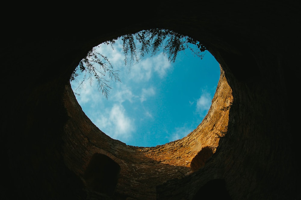 worms eye view of blue sky and white clouds