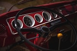 black and red car steering wheel
