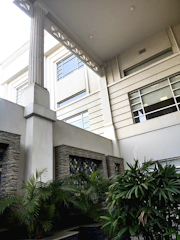 Modern courtyard with clean brick walls blending traditional and contemporary styles.