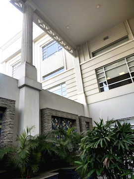 Modern courtyard with clean brick walls blending traditional and contemporary styles.