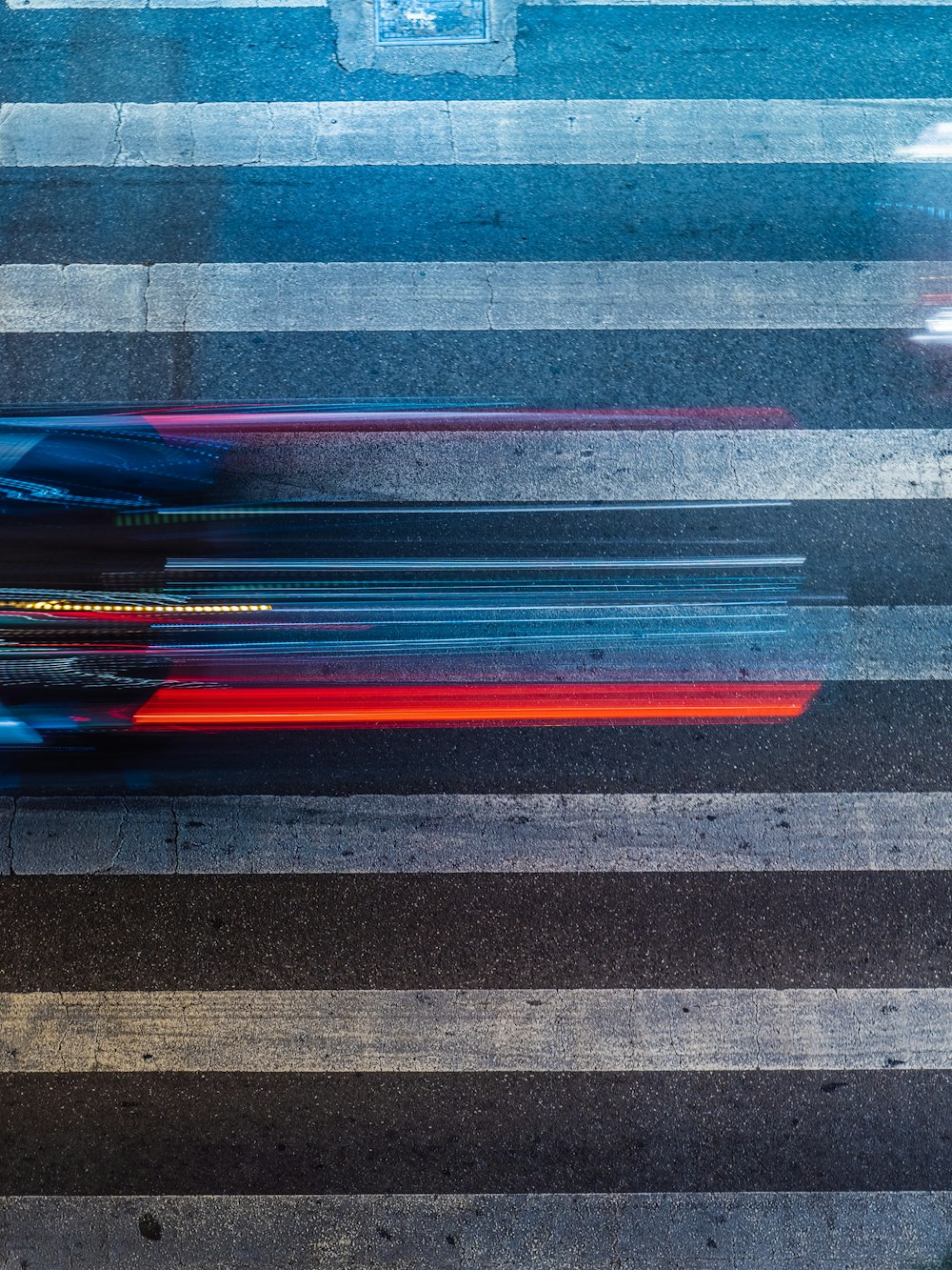 blue red and black striped textile