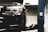 black car in grayscale photography