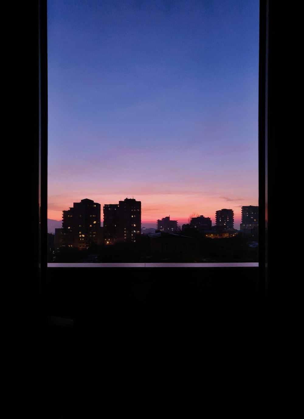 city skyline during night time