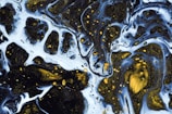 A stunning black and gold abstract artwork.