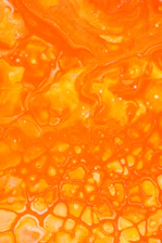 orange liquid in clear glass