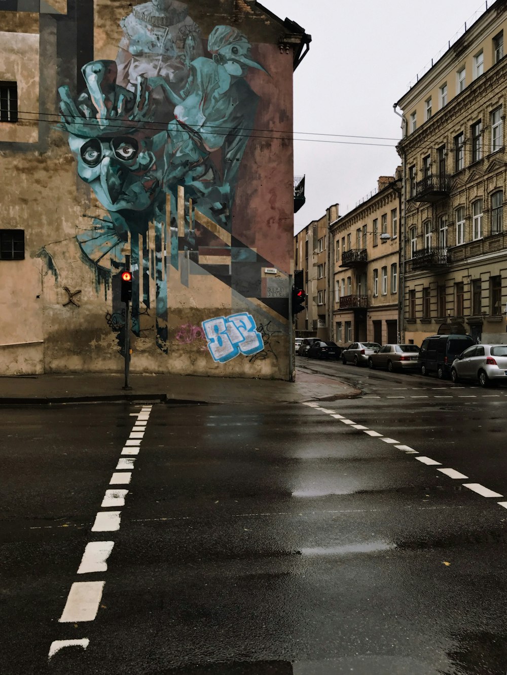 cars parked on side of the road during daytime