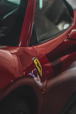 red car with yellow and white sticker