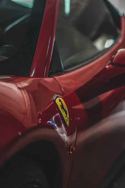 red car with yellow and white sticker