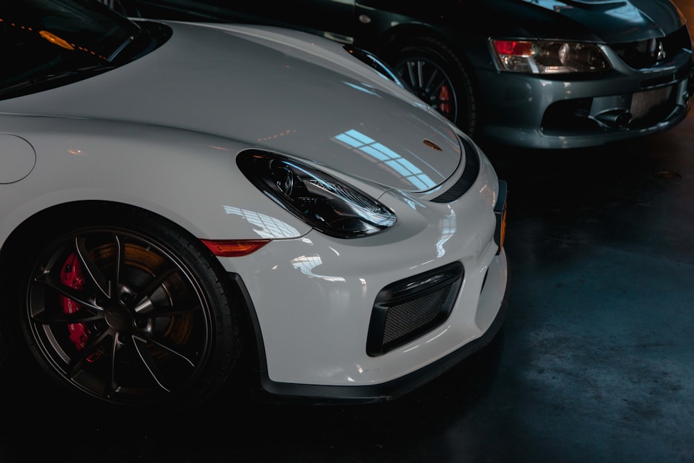 white porsche 911 parked in garage