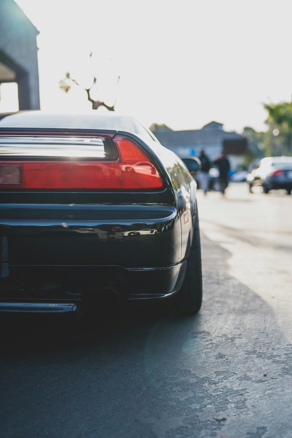 black car on the street during daytime