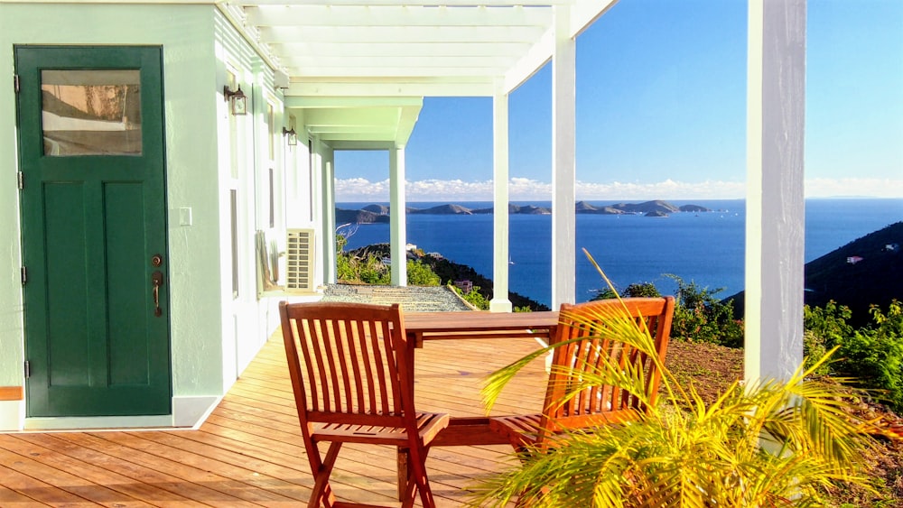 brown wooden armchair on brown wooden deck