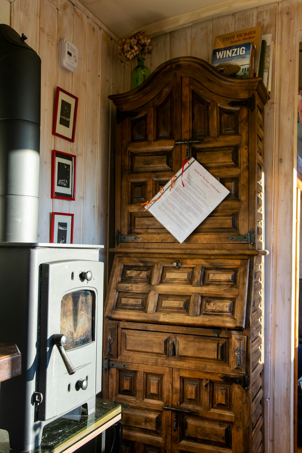 white printer paper on brown wooden cabinet