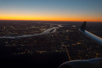 An aerial view of a city skyline at dawn, symbolizing new travel adventures.