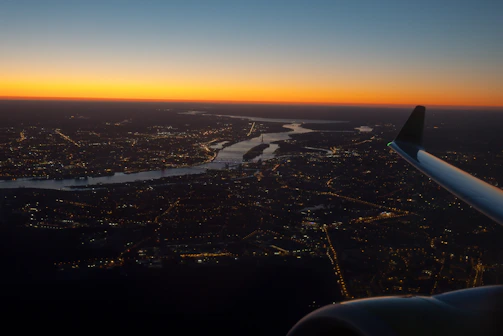 An aerial view of a city skyline at dawn, symbolizing new travel adventures.