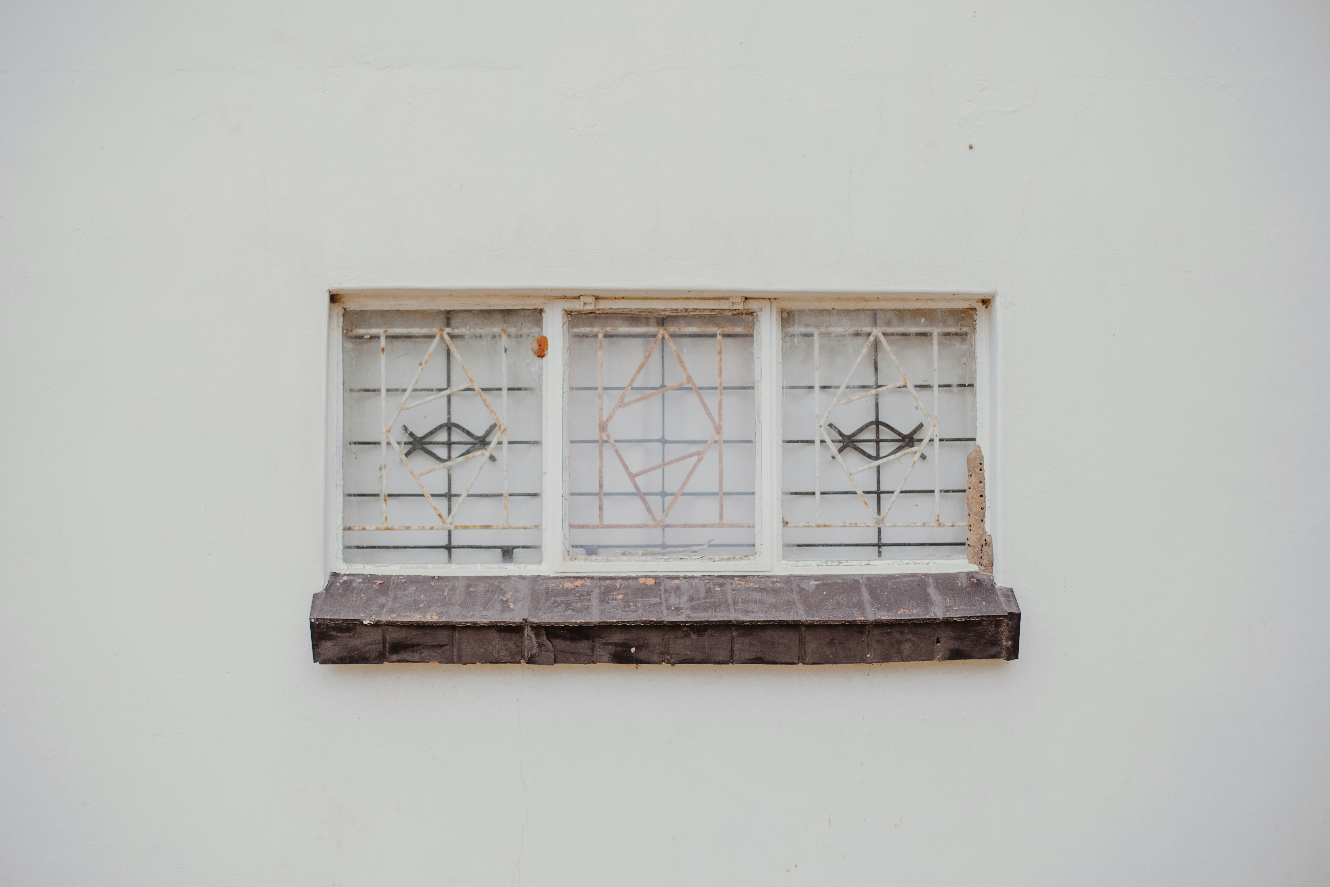 Brown wooden window frame on white wall photo Free Grey Image on Unsplash