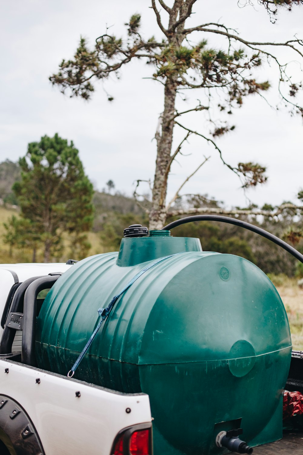 green and black water tank