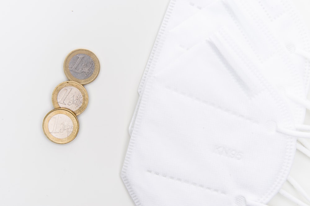 silver and gold round coins