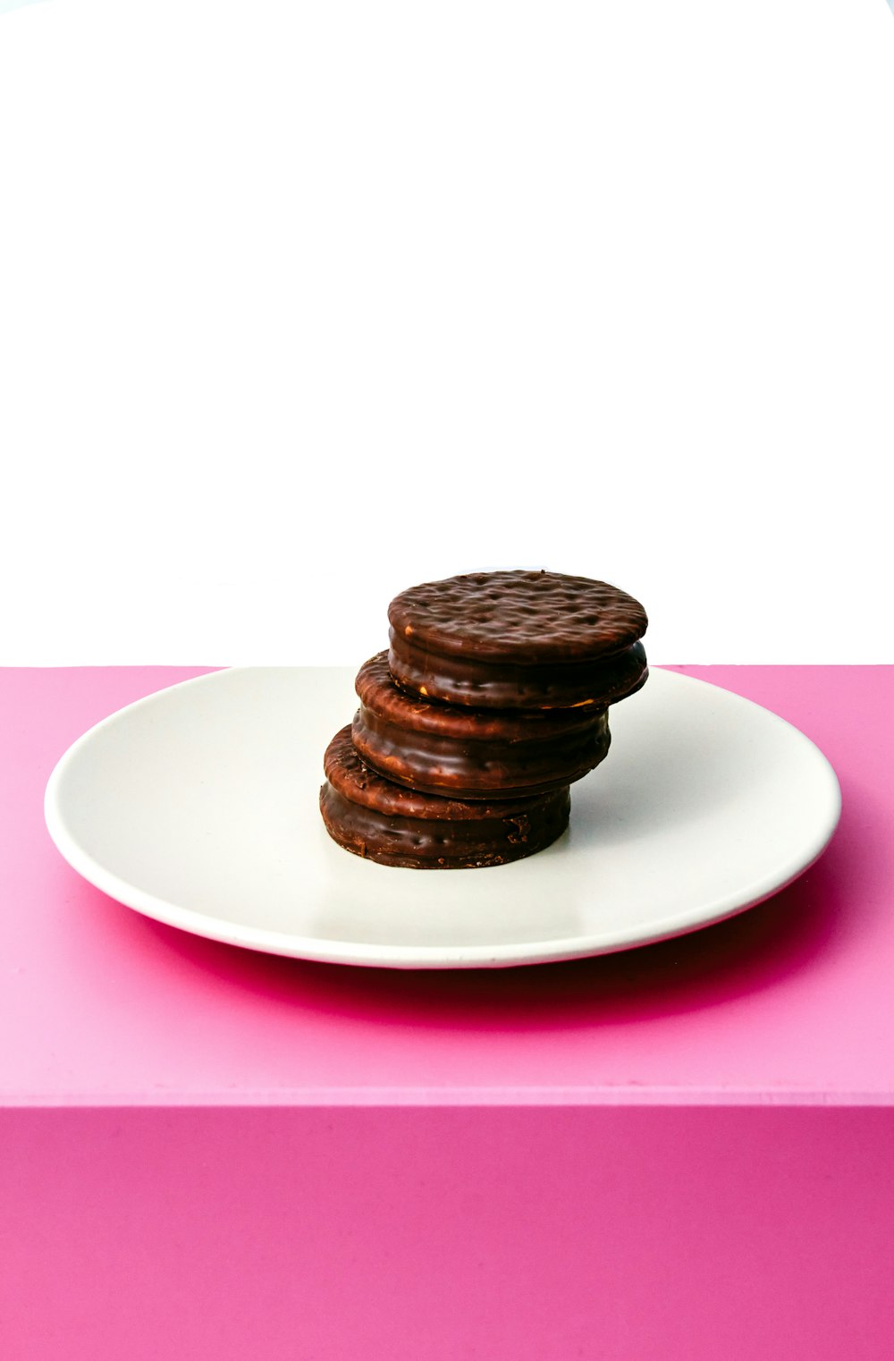 brown cookies on white ceramic plate