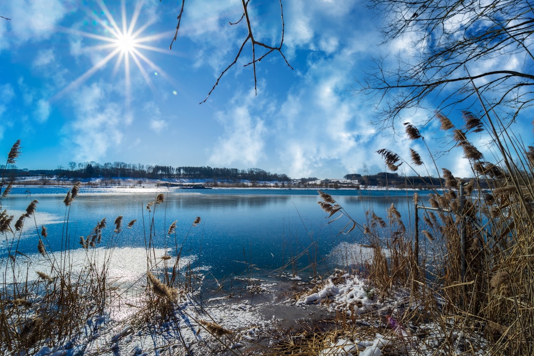 body of water under blue sky during daytime