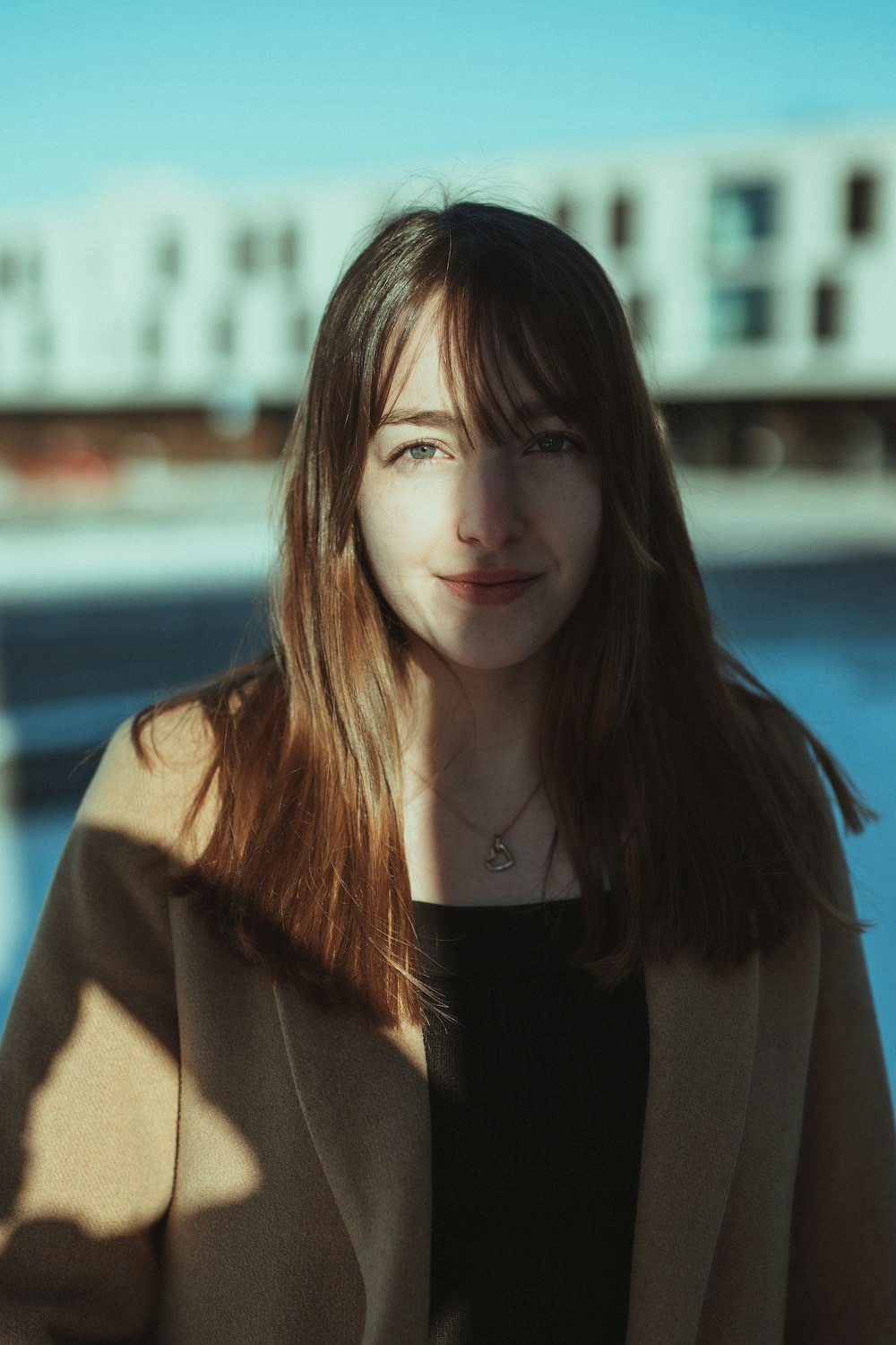 woman in brown and black coat