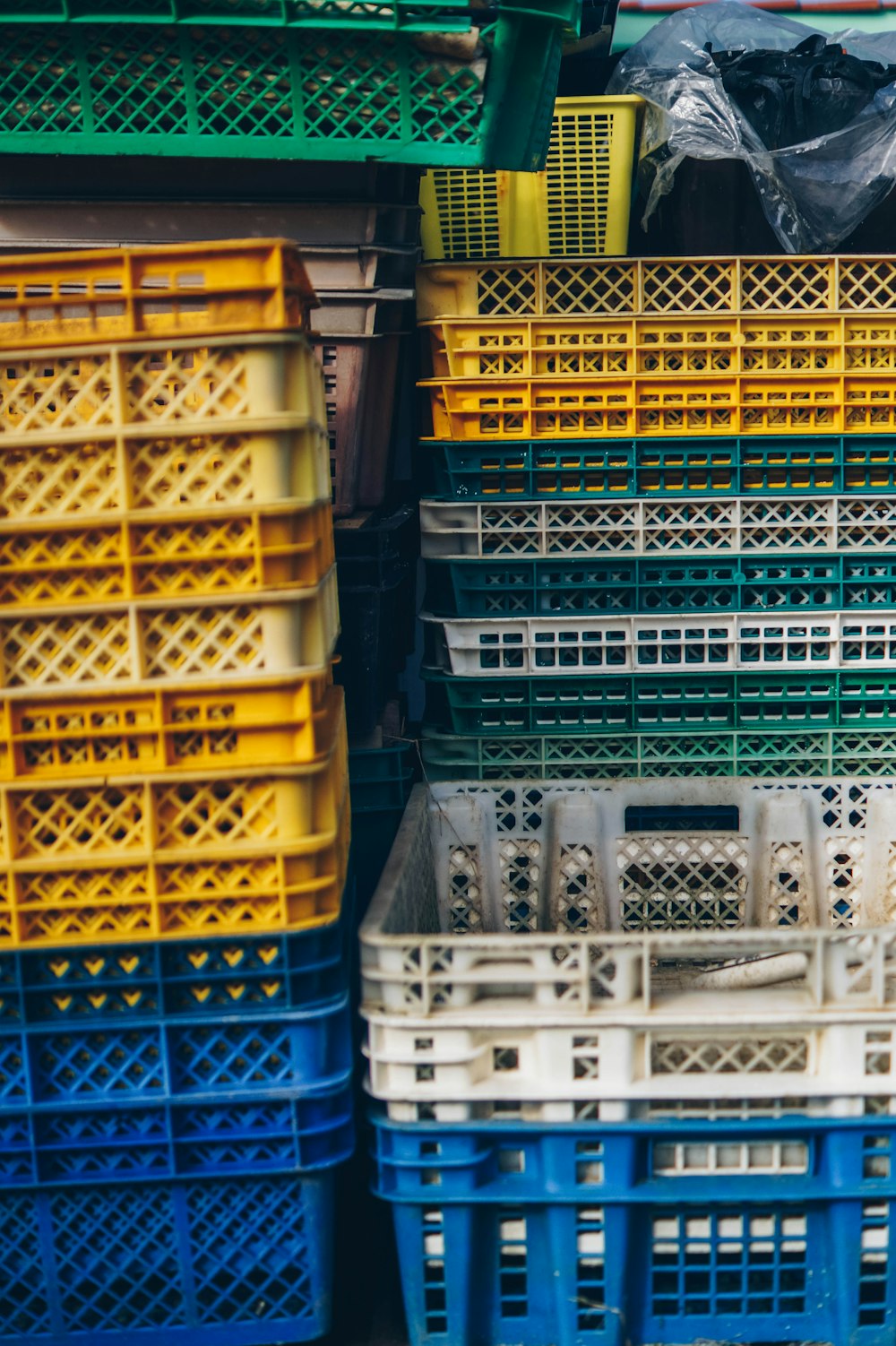yellow and blue plastic crates