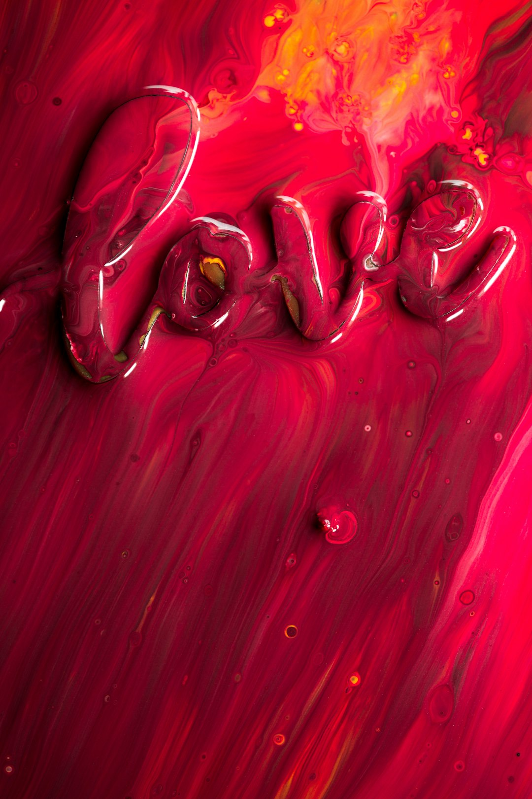 love painted in reds, yellows and pinks