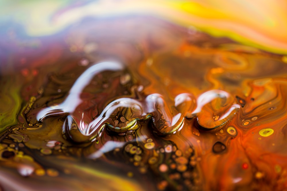 water droplets on brown wooden surface