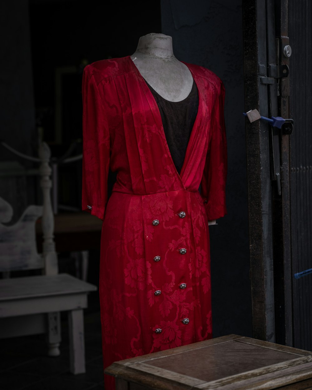 woman in red long sleeve dress standing