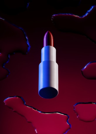 red and blue pen on red heart illustration