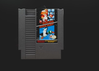 nintendo game boy cartridge on black surface