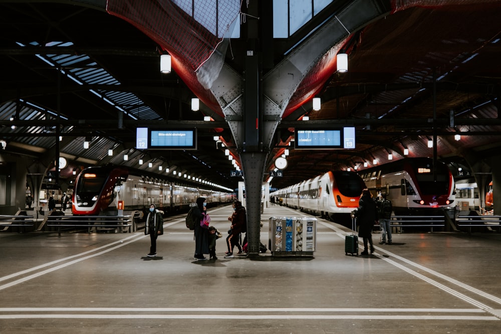 people walking on train station