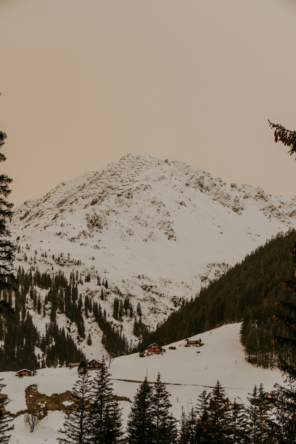 snow covered mountain during daytime