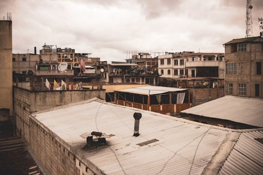 brown and white concrete building during daytime in Chichicastenango Guatemala