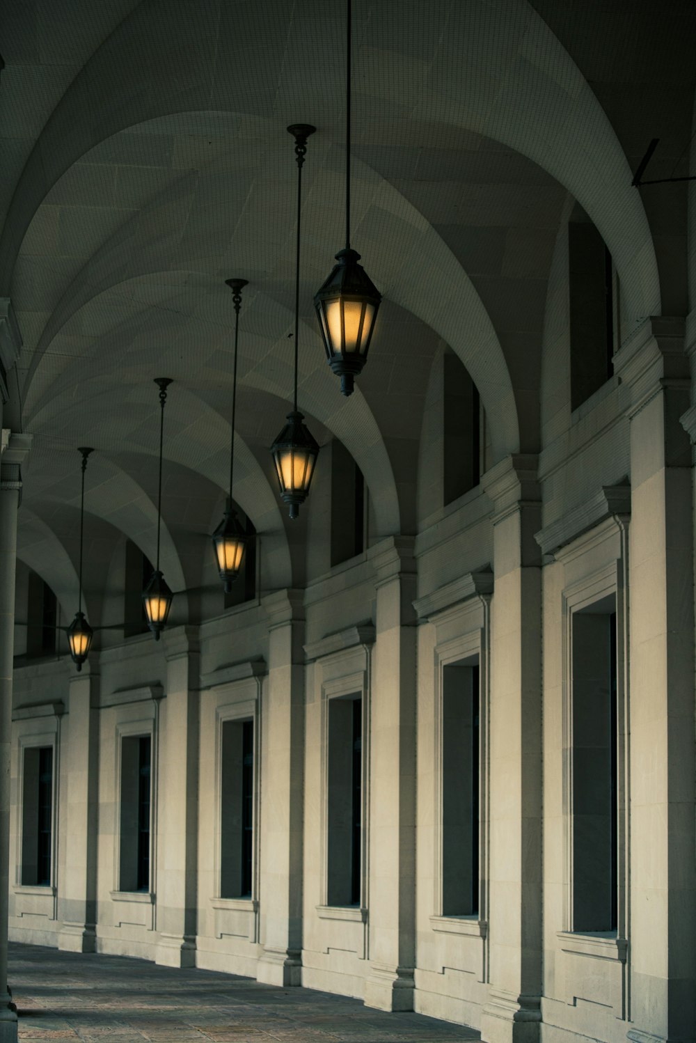 black pendant lamp turned on in building