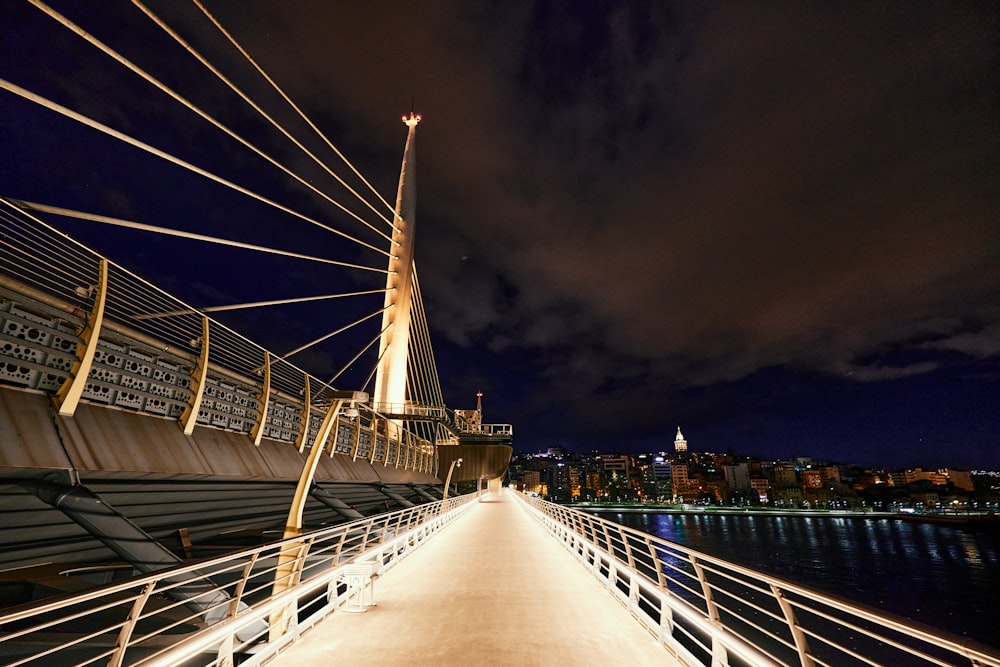 white and gray bridge under white sky during daytime