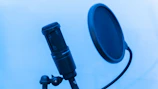 black microphone on white table
