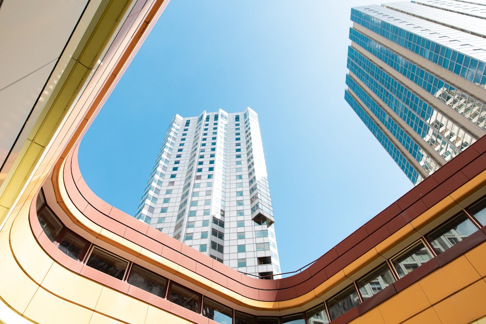 brown and white concrete building under blue sky during daytime