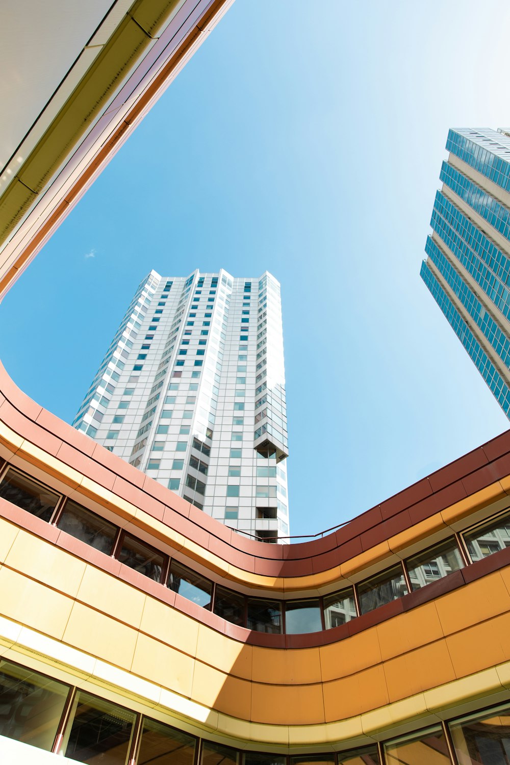 low angle photography of high rise building