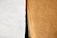 Close-up of a stack of absorbent pad paper sheets with a soft texture.