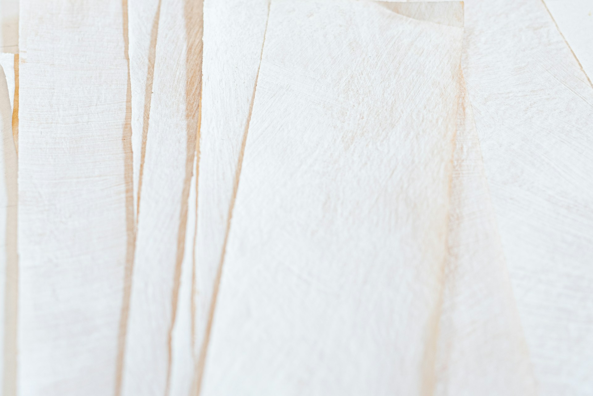 white textile with brown hair
