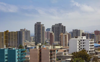 brown and white concrete buildings during daytime