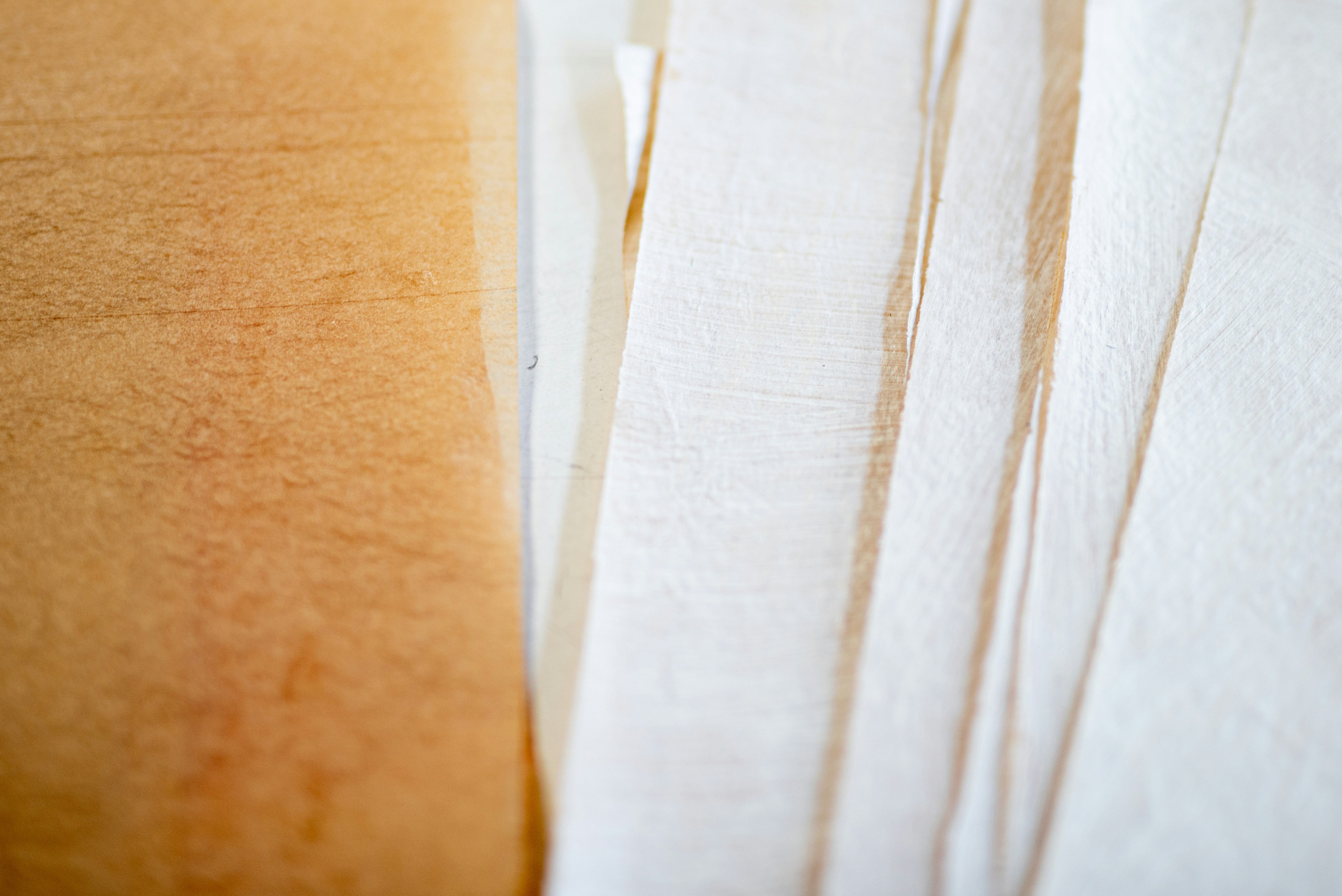 white paper on brown wooden table