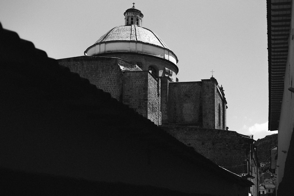 grayscale photo of concrete building