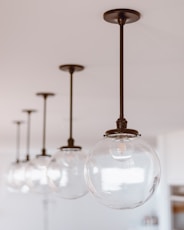 clear glass light bulb with white background