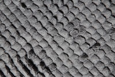 Close-up of huggedby fabric texture showing softness and quality stitching.
