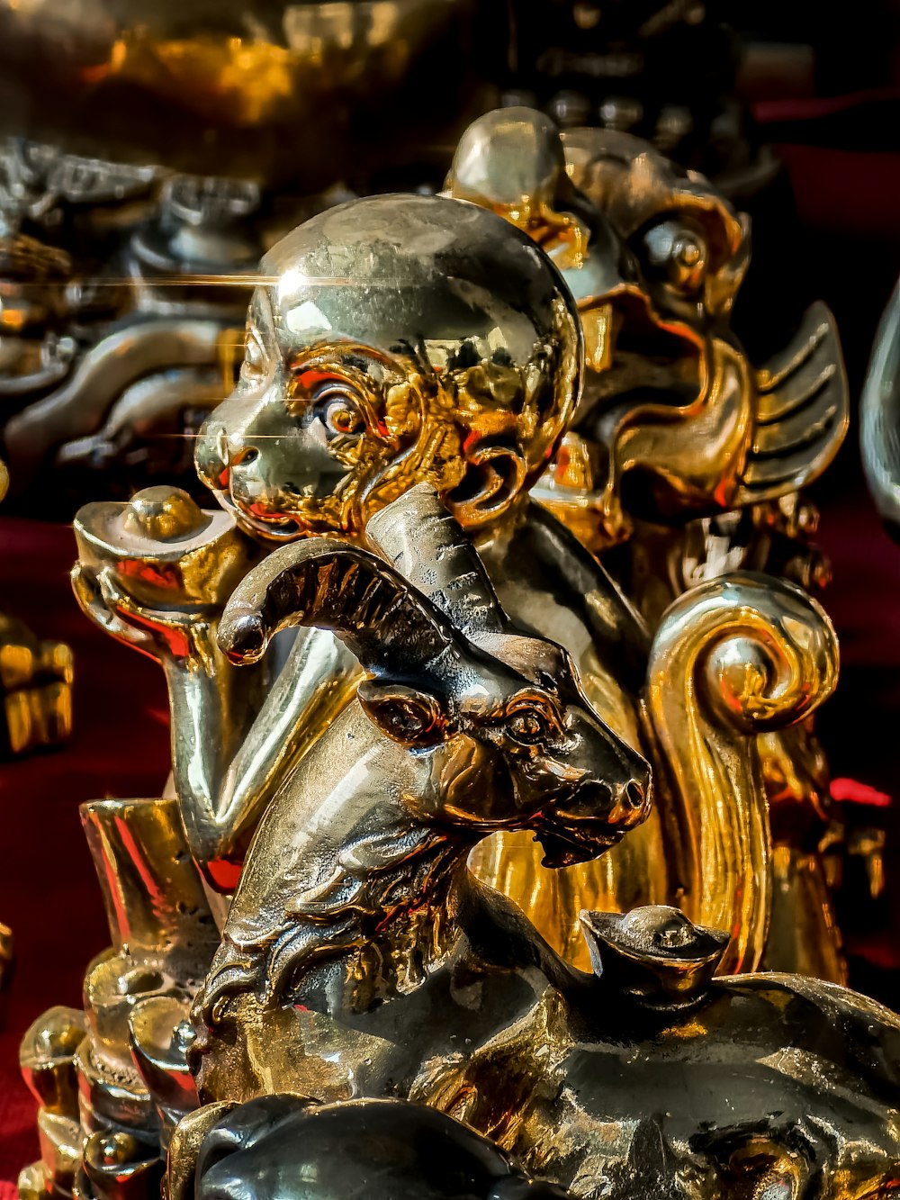 gold dragon statue in close up photography